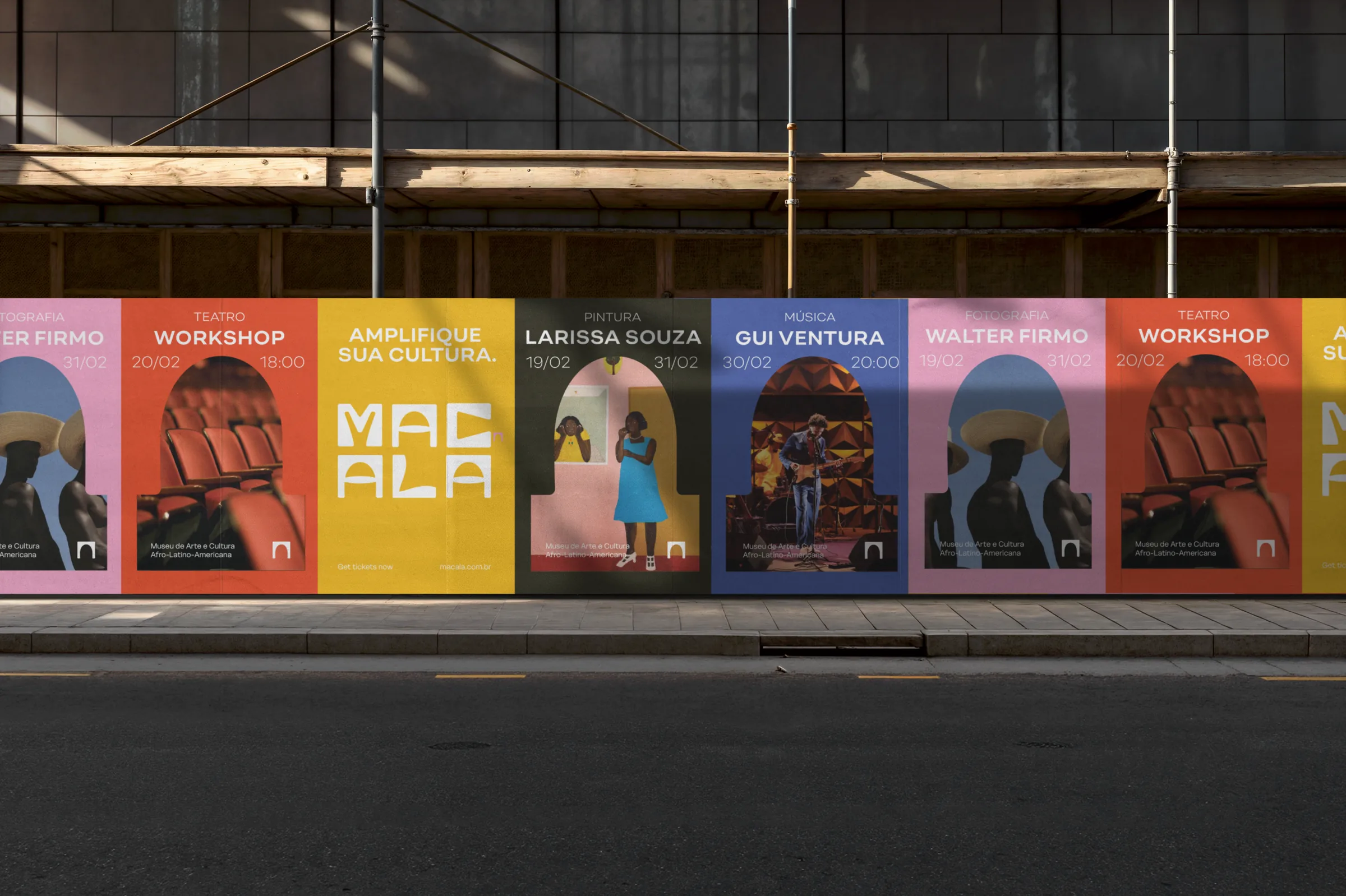Macala event posters on a street wall
